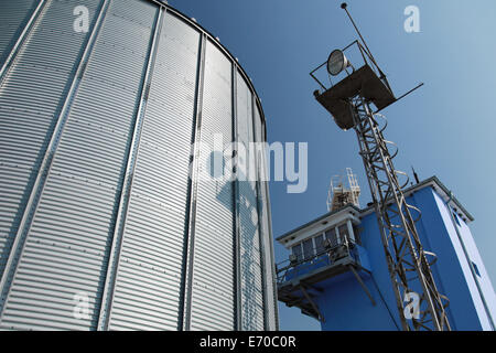 Big metal fuel tanks and blue sky Stock Photo