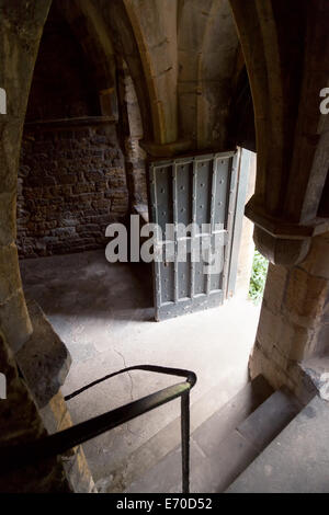 A medieval door, half open, Lincoln castle, Lincolnshire UK Stock Photo