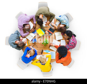 Group of Tired Students Sleeping on the Table Stock Photo