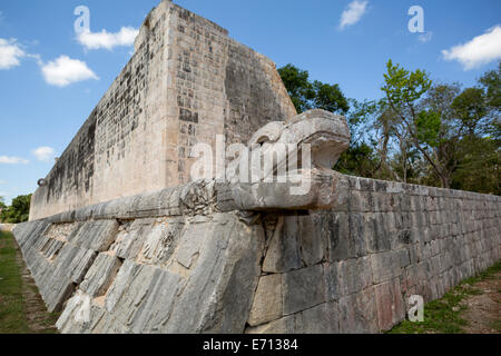 Mayan snake head sculpture on ancient ball court Stock Photo