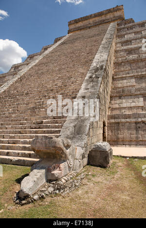 Mayan temple stairs with sculpted snake head in the foreground Stock Photo