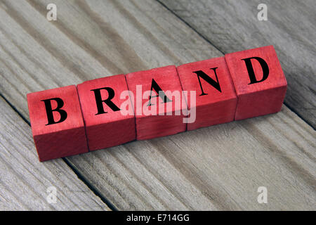 word brand on red wooden cubes