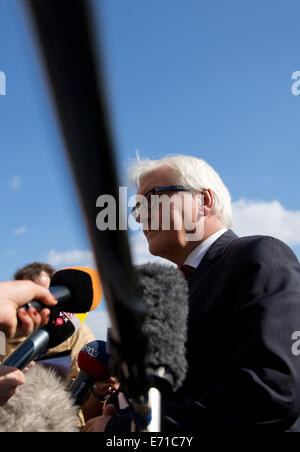 Hamburg, Germany. 03rd Sep, 2014. German Foreign Minister Frank-Walter Steinmeier (SPD) gives a statement about the situation in Ukraine at a closed-door meeting of the SPD parliamentary group in Hamburg, Germany, 03 September 2014. Steinmeier asked Russia and Ukraine for a real cease-fire. Photo: Christian Charisius/dpa/Alamy Live News Stock Photo