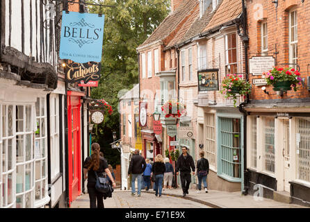 People walking on Steep Hill, an ancient street in Lincoln, England UK Stock Photo