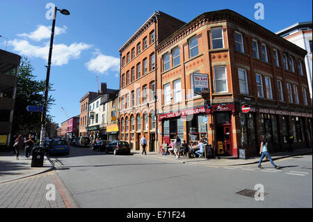 Junction of Thomas and Tib Streets in the Northern Quarter of Manchester - the Cultural Quarter. Stock Photo