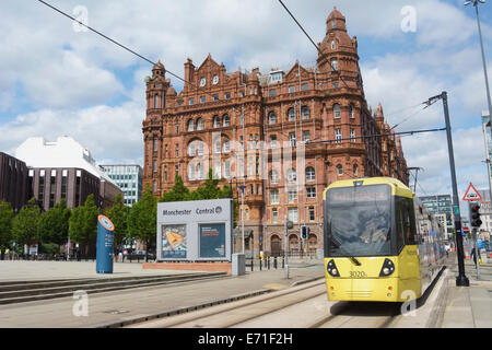 Metrolink tram with Midland hotel in the background in central Manchester. Stock Photo