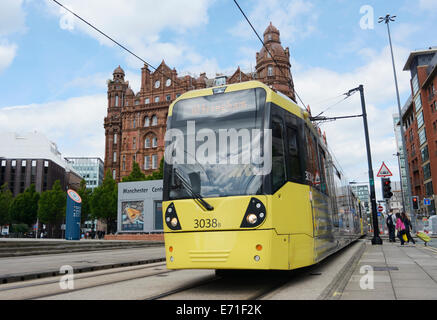 Metrolink tram with Midland hotel in the background in central Manchester. Stock Photo