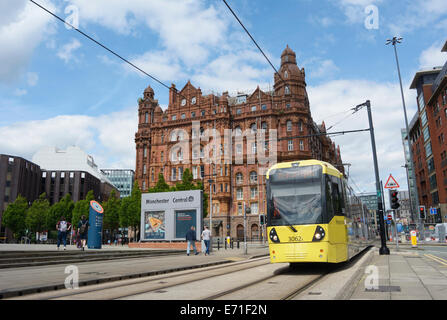 Metrolink tram with Midland hotel in the background in central Manchester. Stock Photo