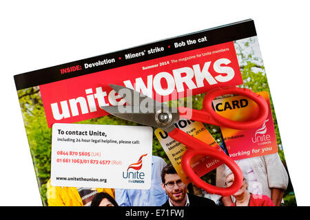 unite union members magazine with membership card cut in half Stock Photo