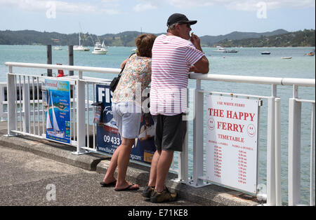 Tourists on the pier at Paihia North island New Zealand Stock Photo