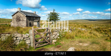 A derelict and abandoned farmhouse at Nun's Cross a remote part of Dartmoor National Park near Princetown in Devon Stock Photo