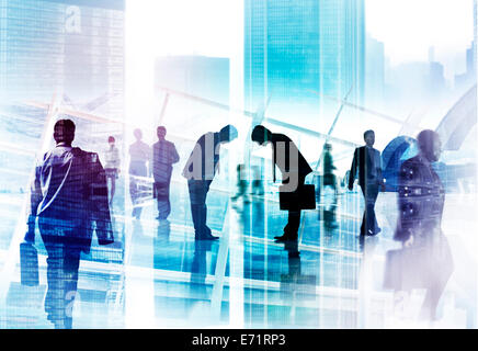 Two Businessmen Bowing and Business People Stock Photo