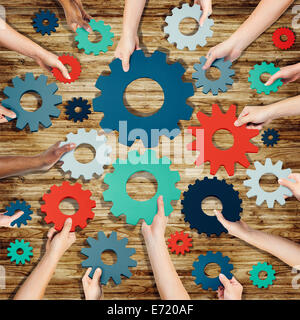 Diverse People Hands Holding Gear Wheels. Business Partnership Stock ...