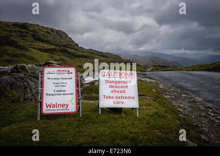 Warning signs at the Fred Whitton Cycling Challenge. Stock Photo