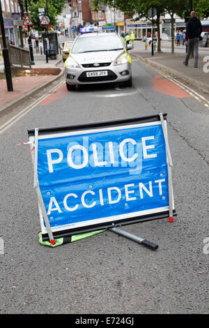 England, West Sussex, East Grinstead, Police attending the scene of a traffic accident. Stock Photo