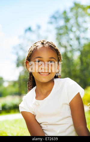 Close portrait of black girl in the park Stock Photo