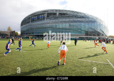 Kids playing football at the Aviva Stadium in Dublin city, Ireland Stock Photo