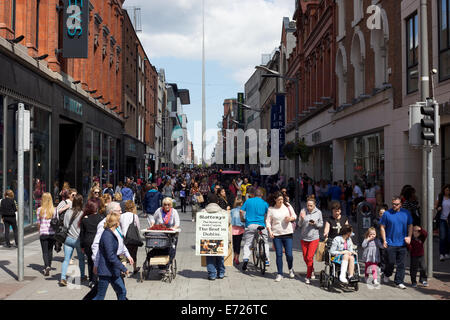 People walking around O'Connell Street and Jervis Street area of Dublin city, Ireland Stock Photo