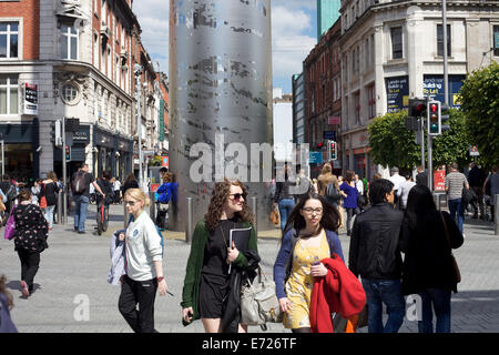 People walking around O'Connell Street area of Dublin city, Ireland Stock Photo
