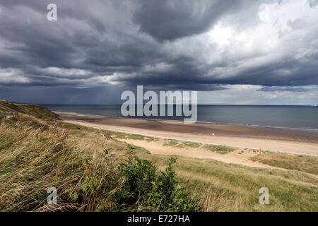 A storm cloud over the North sea at Hartlepool beach in the north east of England, UK Stock Photo