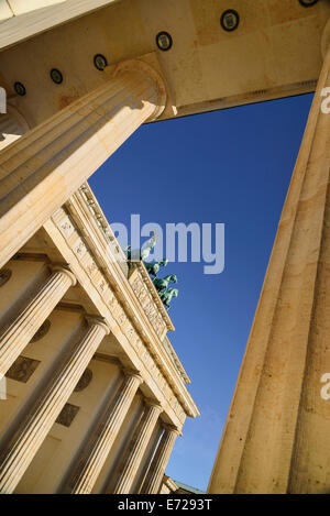 Germany, Berlin, Angular view of the Brandenburg Gate viewed through side columns. Stock Photo