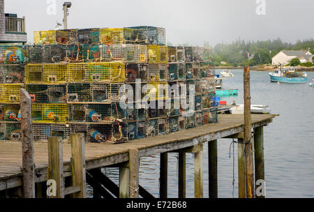 Lobster traps on a pier in Bass Harbor Maine Stock Photo