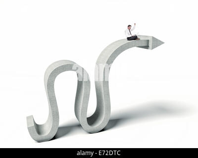 business man with pc on abstract concrete arrow Stock Photo