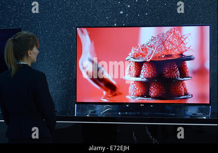 Berlin, Germany. 04th Sep, 2014. An LG OLED TV decorated with Swarovski crystals is on display at the exhibition booth of LG during the second media preview day of the Consumer electronics and Home appliances fair IFA (for 'Internationale Funk Ausstellung'), in Berlin, Germany, 04 September 2014. IFA will take place from 05 to 10 September 2014. PHOTO: RAINER JENSEN/dpa/Alamy Live News Stock Photo