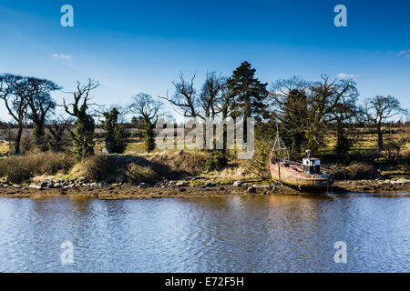 An old boat on the shores of Lough Swilly County Donegal Republic Ireland Stock Photo