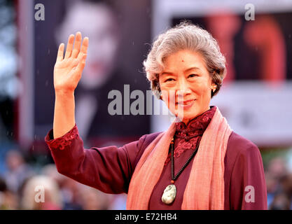 Venice, Italy. 4th Sep, 2014. Chinese actress Lu Zhong poses on the red carpet for the movie 'Red amnesia' which is selected for the main competition during the 71st Venice Film Festival, in Lido of Venice, Italy, Sept. 4, 2014. Credit:  Xu Nizhi/Xinhua/Alamy Live News Stock Photo