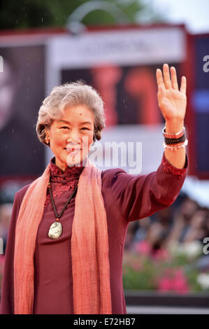 Venice, Italy. 4th Sep, 2014. Chinese actress Lu Zhong poses on the red carpet for the movie 'Red amnesia' which is selected for the main competition during the 71st Venice Film Festival, in Lido of Venice, Italy, Sept. 4, 2014. Credit:  Xu Nizhi/Xinhua/Alamy Live News Stock Photo