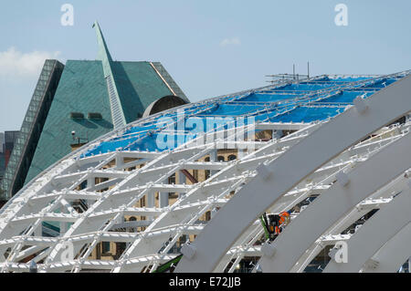 Worker on an access platform working on the new roof being constructed at Victoria Station, Manchester, England, UK Stock Photo