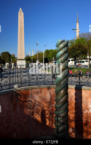 At the Hippodrome of Istanbul, Turkey. In the foreground the Serpent Column, in the background the Obelisk of Theodosius Stock Photo