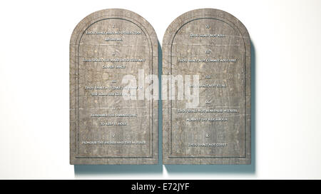 Two stone tablets with the ten commandments inscribed on them on an isolated background Stock Photo