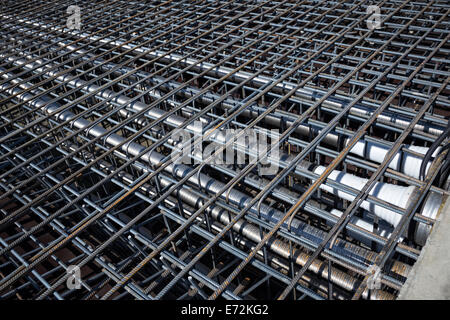 Ferro-concrete reinforcement with tensioned cables in the superstructure of the bridge. Stock Photo