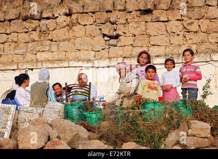 Traditional Turkish family in Mazi (Mazikoy) village, Nevsehir, Cappadocia, Turkey Stock Photo