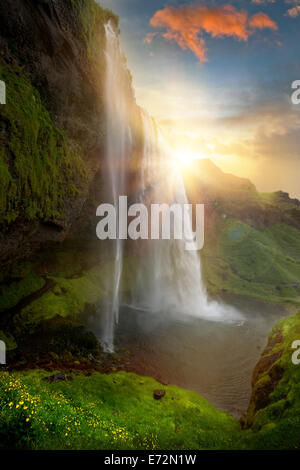 Beautiful and dramatic sunset in Seljalandsfoss waterfalls, Iceland ...