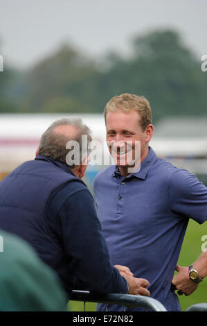 Burghley House, Stamford, Lincolnshire, UK . 03rd Sep, 2014. Oliver Townend chatting before the Dressage phase of the 2014 Land Rover Burghley Horse Trials held at Burghley House, Stamford, Lincolnshire Credit:  Jonathan Clarke/Alamy Live News Stock Photo