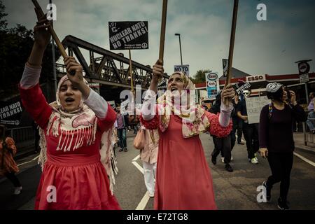 Cardiff, Wales, UK. 4th Sept, 2014. Demonstrators with their placards march against the NATO summit in Newport Credit:  Matthias Oesterle/ZUMA Wire/ZUMAPRESS.com/Alamy Live News Stock Photo
