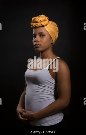 Portrait of young woman in headscarf Stock Photo