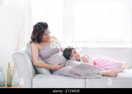 View of pregnant woman with daughter (6-7) Stock Photo