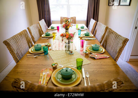 Set table in dining room Stock Photo