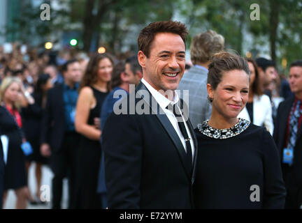 Toronto, Canada. 4th Sep, 2014. Actor Robert Downey Jr. and his wife Susan Downey arrive for the premiere of the opening film 'The Judge' at Roy Thomson Hall during the 39th Toronto International Film Festival in Toronto, Canada, Sept. 4, 2014. Kicked off on Thursday, this 11-day event delivers 406 films from over 80 countries and regions this year. Credit:  Zou Zheng/Xinhua/Alamy Live News Stock Photo