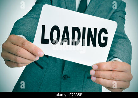 a man wearing a suit showing a signboard with the word enterprise ...