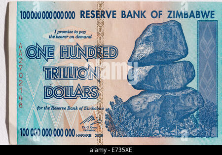 A Zimbabwean one hundred trillion dollar note as was in circulation in 2008 during the period of hyper-inflation in Zimbabwe Stock Photo