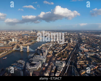 Aerial cityscape showing River Thames, Tower Bridge and railway tracks, London, England, United Kingdom, Europe Stock Photo