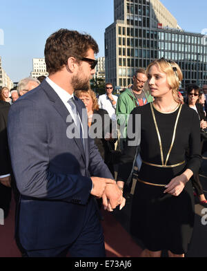 Actress Diane Kruger and her partner Joshua Jackson attend the re-opening ceremony of 'Boulevard of the Stars' at Potsdamer Platz, Berlin, Germany, 4 September 2014. There are 101 stars on the boulevard representing German film and TV celebrities. Photo: Jens Kalaene/dpa Stock Photo