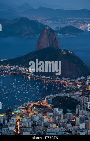 View from Cristo Redentor over Rio de Janeiro at night, Corcovado, Rio de Janeiro, Brazil, South America Stock Photo