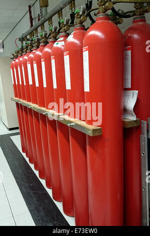 Giant Argon Fire Extinguishers in a rack in a  computer server room Stock Photo