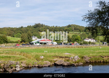 Moel Siabod cafe on A5 road from across Afon Llugwy River in Snowdonia National Park. Capel Curig, Conwy, Wales, UK, Britain Stock Photo
